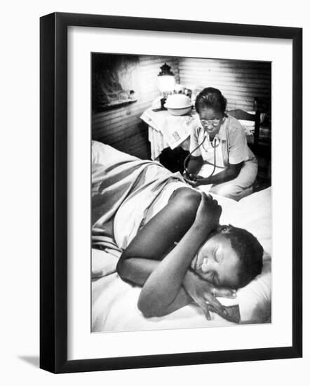 Famous Midwife-Nurse Maude Callen, Attending a Woman in Labor-W^ Eugene Smith-Framed Photographic Print