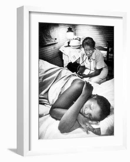 Famous Midwife-Nurse Maude Callen, Attending a Woman in Labor-W^ Eugene Smith-Framed Photographic Print