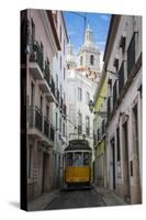 Famous Tram 28 Going Through the Old Quarter of Alfama, Lisbon, Portugal, Europe-Michael Runkel-Stretched Canvas