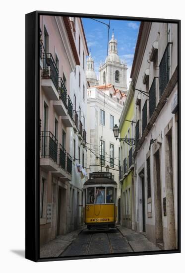 Famous Tram 28 Going Through the Old Quarter of Alfama, Lisbon, Portugal, Europe-Michael Runkel-Framed Stretched Canvas