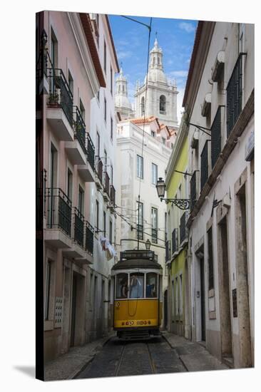 Famous Tram 28 Going Through the Old Quarter of Alfama, Lisbon, Portugal, Europe-Michael Runkel-Stretched Canvas