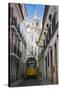 Famous Tram 28 Going Through the Old Quarter of Alfama, Lisbon, Portugal, Europe-Michael Runkel-Stretched Canvas