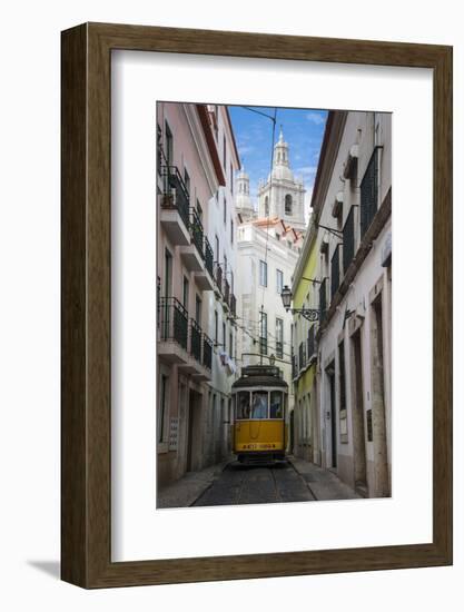 Famous Tram 28 Going Through the Old Quarter of Alfama, Lisbon, Portugal, Europe-Michael Runkel-Framed Photographic Print