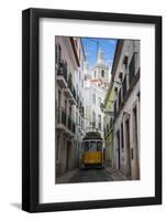 Famous Tram 28 Going Through the Old Quarter of Alfama, Lisbon, Portugal, Europe-Michael Runkel-Framed Photographic Print