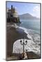 Fancy Street Lamp, Rusty Anchor and Wave Breaking on Beach, Distant Church-Eleanor Scriven-Mounted Photographic Print