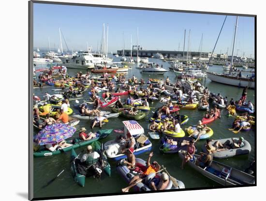 Fans Crowd into Boats, Kayaks, and Rafts Waiting for Their Chance to Catch a Home Run Ball-null-Mounted Photographic Print