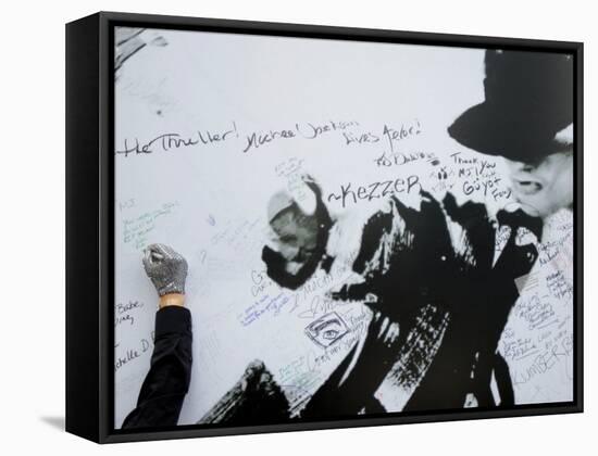 Fans Sign Tribute Wall to Michael Jackson outside the Staples Center, Los Angeles, July 7, 2009-null-Framed Stretched Canvas