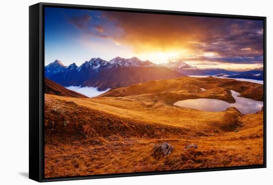 Fantastic Lake Koruldi with Overcast Red Sky at the Foot of Mt. Ushba. Dramatic Scene. Location Fam-Leonid Tit-Framed Stretched Canvas