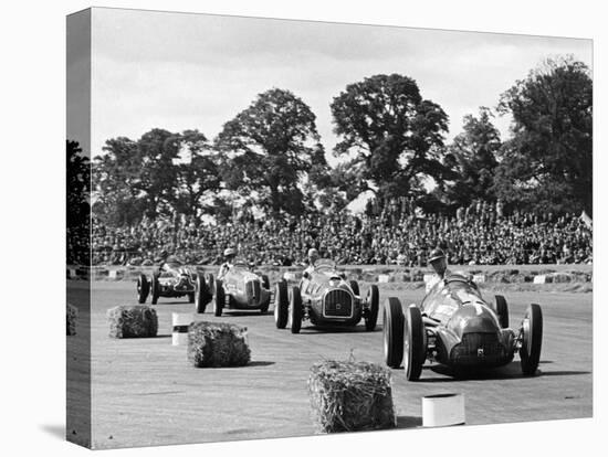 Farina leads the field in his Alfa Romeo 159 during Daily Express Trophy, Silverstone-null-Stretched Canvas