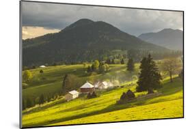 Farm and Haystacks in the Rural Transylvania Landscape at Sunset, Piatra Fantanele, Transylvania-Matthew Williams-Ellis-Mounted Photographic Print