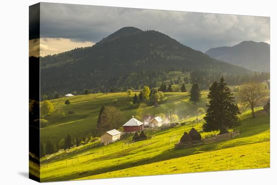 Farm and Haystacks in the Rural Transylvania Landscape at Sunset, Piatra Fantanele, Transylvania-Matthew Williams-Ellis-Stretched Canvas