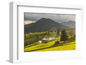 Farm and Haystacks in the Rural Transylvania Landscape at Sunset, Piatra Fantanele, Transylvania-Matthew Williams-Ellis-Framed Photographic Print