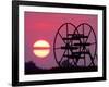 Farm Equipment is Silhouetted by a Setting Sun-null-Framed Photographic Print