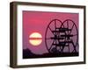 Farm Equipment is Silhouetted by a Setting Sun-null-Framed Photographic Print