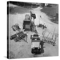 Farm Equipment Surrounding a Farmer's Jeep in Demonstration of Postwar Uses for Military Vehicles-Myron Davis-Stretched Canvas