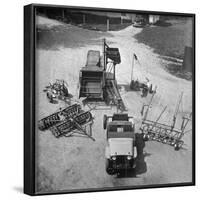 Farm Equipment Surrounding a Farmer's Jeep in Demonstration of Postwar Uses for Military Vehicles-Myron Davis-Framed Photographic Print