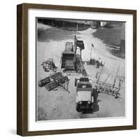 Farm Equipment Surrounding a Farmer's Jeep in Demonstration of Postwar Uses for Military Vehicles-Myron Davis-Framed Photographic Print