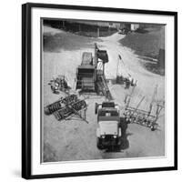 Farm Equipment Surrounding a Farmer's Jeep in Demonstration of Postwar Uses for Military Vehicles-Myron Davis-Framed Photographic Print