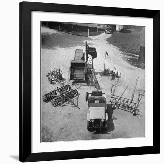 Farm Equipment Surrounding a Farmer's Jeep in Demonstration of Postwar Uses for Military Vehicles-Myron Davis-Framed Photographic Print