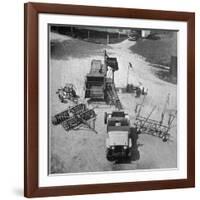 Farm Equipment Surrounding a Farmer's Jeep in Demonstration of Postwar Uses for Military Vehicles-Myron Davis-Framed Photographic Print