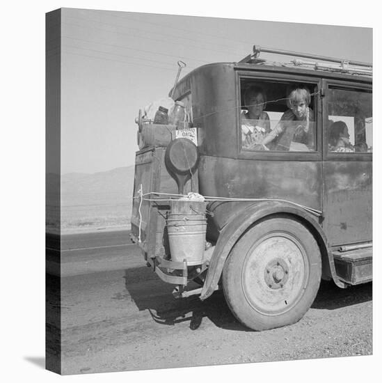 Farm family drive away from the Dust Bowl, 1936-Dorothea Lange-Stretched Canvas