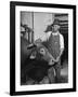 Farm Worker Petting One of the Cows Living on a Dairy Farm-Hansel Mieth-Framed Photographic Print