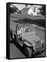 Farmer and Family Riding in a Jeep in Demonstration of Postwar Uses for Military Vehicles-null-Framed Stretched Canvas