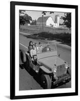 Farmer and Family Riding in a Jeep in Demonstration of Postwar Uses for Military Vehicles-null-Framed Photographic Print