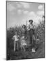 Farmer Carl Snider Standing with Family in Front of Cornfield-null-Mounted Photographic Print