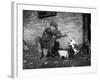 Farmer Feeding Cats-null-Framed Photographic Print