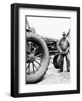 Farmer Is a Blur of Activity Working on His Tractor, Ca. 1938-null-Framed Premium Photographic Print