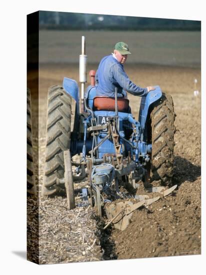 Farmer Ploughing Near Sonning Common, Oxfordshire, England, United Kingdom-Robert Francis-Stretched Canvas