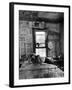 Farmer's Daughter Delphaline, Reading a Book as She Lies on Iron Bed in Her Bedroom-Alfred Eisenstaedt-Framed Photographic Print