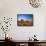 Farmer Unloading Wheat from Combine Near Colfax, Washington, USA-Chuck Haney-Framed Stretched Canvas displayed on a wall