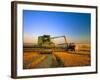 Farmer Unloading Wheat from Combine Near Colfax, Washington, USA-Chuck Haney-Framed Photographic Print