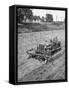 Farmer Using Jeep as a Cultivator in Demonstration of Postwar Uses for Military Vehicles-null-Framed Stretched Canvas