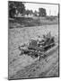 Farmer Using Jeep as a Cultivator in Demonstration of Postwar Uses for Military Vehicles-null-Mounted Photographic Print