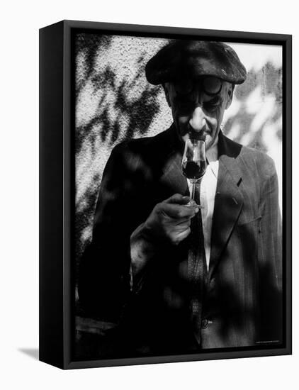 Farmer Who Has Brought His Grapes to the Hennessy and Co. Distillery Sampling Some Brandy-Gjon Mili-Framed Stretched Canvas