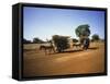 Farmers with Donkey Carts, Burkina Faso, West Africa-Ellen Clark-Framed Stretched Canvas