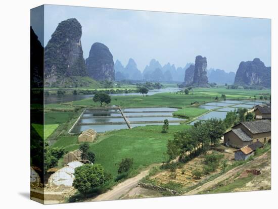 Farmland and Rock Formations of Guangxi, Guilin Province, China-Anthony Waltham-Stretched Canvas