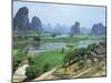 Farmland and Rock Formations of Guangxi, Guilin Province, China-Anthony Waltham-Mounted Photographic Print