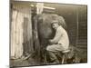 Farmworker Milks a Cow by Hand in a Very Primitive Cow- House-null-Mounted Photographic Print