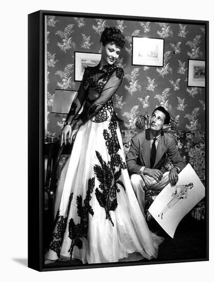 Fashion Designer Oleg Cassini Showing His Drawings to Gene Tierney to Show Her the Clothes in 1941-null-Framed Stretched Canvas