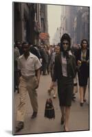 Fashion Model Brigitte Wasserman Walks Along 7th Avenue, New York, New York, 1960-Walter Sanders-Mounted Photographic Print