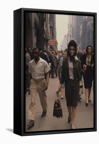 Fashion Model Brigitte Wasserman Walks Along 7th Avenue, New York, New York, 1960-Walter Sanders-Framed Stretched Canvas