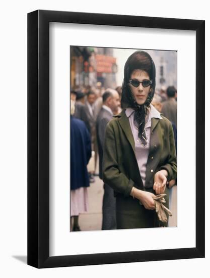 Fashion Model Brigitte Wasserman Walks Along 7th Avenue, New York, New York, 1960-Walter Sanders-Framed Photographic Print