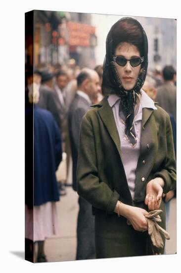 Fashion Model Brigitte Wasserman Walks Along 7th Avenue, New York, New York, 1960-Walter Sanders-Stretched Canvas