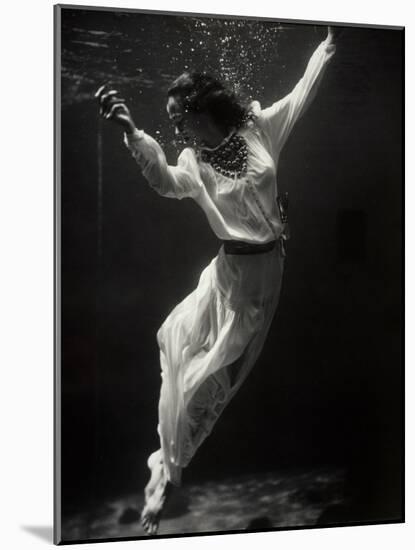 Fashion Model Underwater in Dolphin Tank-null-Mounted Photographic Print