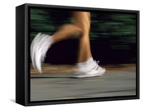 Fast Moving Feet and Legs-null-Framed Stretched Canvas
