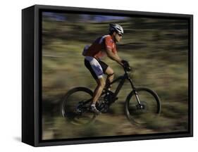 Fast Moving Mountain Biker, Mt. Bike-Michael Brown-Framed Stretched Canvas
